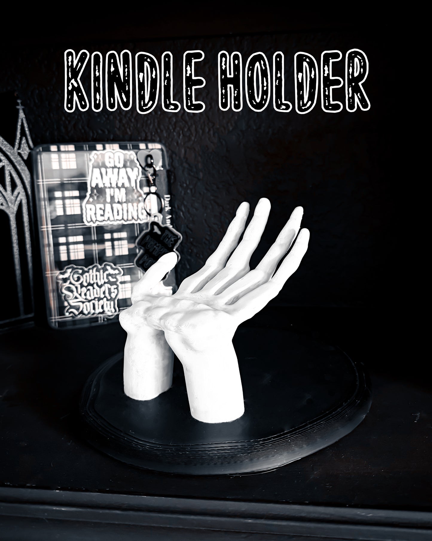 Skeleton hand Kindle Stand