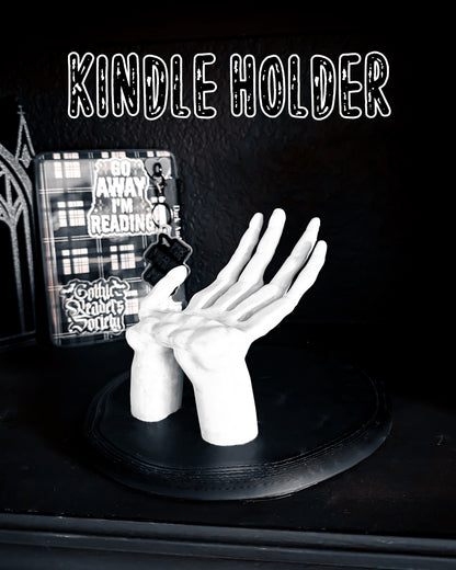 Skeleton hand Kindle Stand